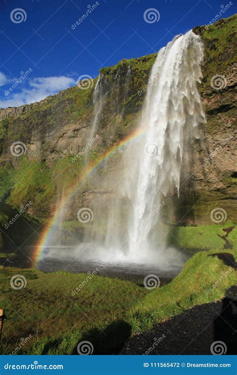 Rainbow and Waterfall Seljalandsfoss in Iceland Stock Photo - Image of ...