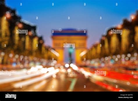 Arch of Triumph at night, Bokeh background Stock Photo - Alamy