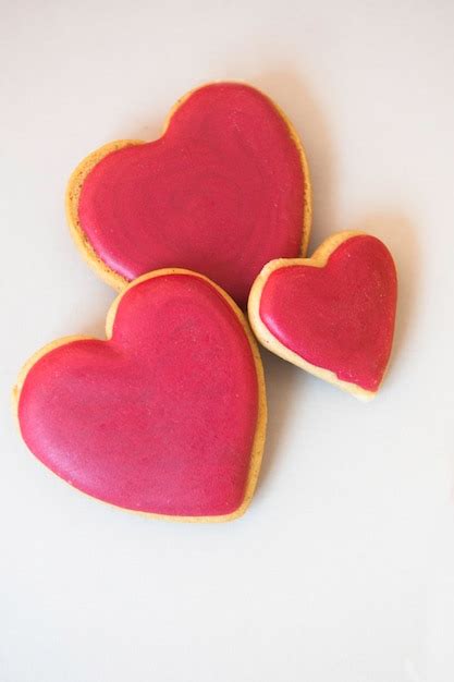 Premium Photo Decorated Heart Shaped Cookies On White