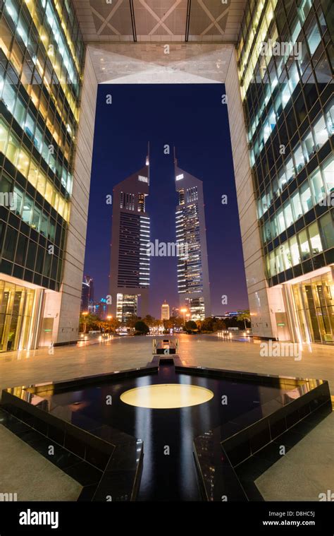 Night View Of Emirates Towers From The Gate At Difc Or Dubai