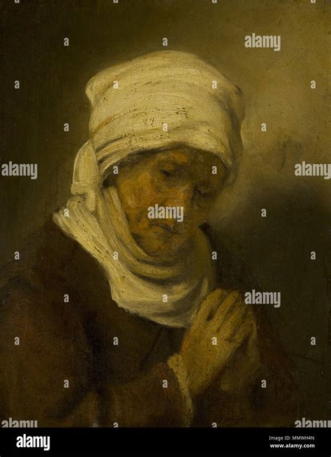 Praying Woman. Circa 1660. Rembrandt - Praying Woman Stock Photo - Alamy