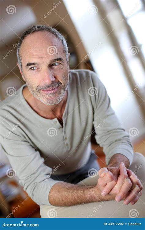 Mature Man Relaxing In Sofa Stock Image Image Of Peaceful Camera