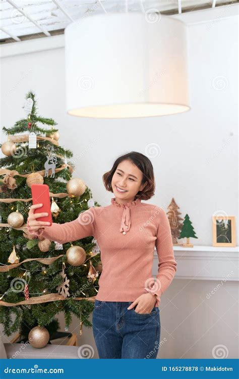 Holidays Winter And People Concept Happy Young Woman Taking Selfie