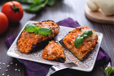 Cheesy rice-stuffed eggplant - Italian recipes by GialloZafferano