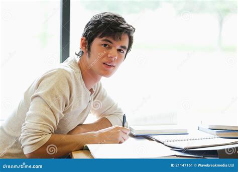 Handsome Student Writing A Paper Stock Image Image 21147161