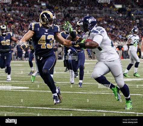 Seattle Seahawks Running Back Marshawn Lynch Runs Past St Louis