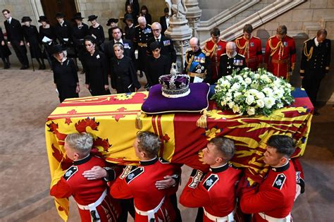 Thousands pass Queen Elizabeth's coffin as she lies in state in London ...