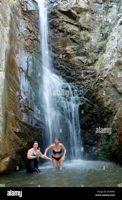 Tourist Couple Playing In Millomeri Waterfall Near Platres In Troodos