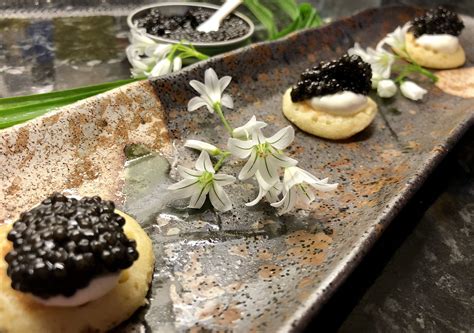 Caviar Canapés with Wild Garlic Flowers - Urban Merchants