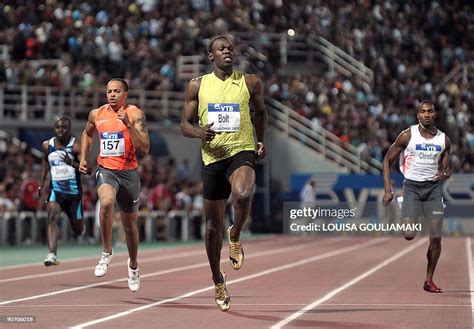 Usain Bolt Of Jamaica Wins To Victory In The Mens 200 Metre Event