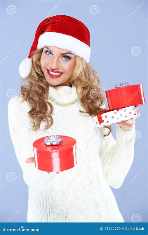 Pretty Woman In Santa Hat Holding Christmas Ts Stock Image Image