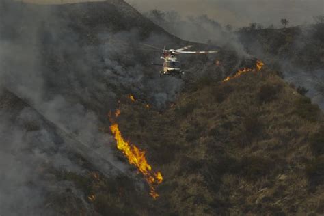 Photos Palisades Fire In California Threatens Homes Prompts