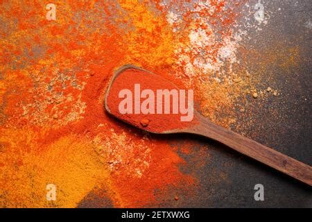 Indian Woman Hand Powdering Indian Spices Coriander Powder In Stone