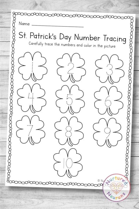 The St Patrick S Day Number Training Sheet With Four Leaf Clovers On It