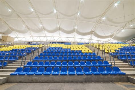 Premium Photo Low Angle View Of Empty Chairs In Stadium At Night