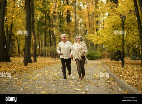 Mature Couple Walking Stock Photo Alamy