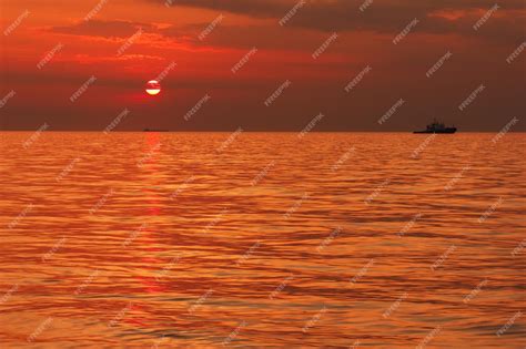 premium photo seascape   boat   background  sunset