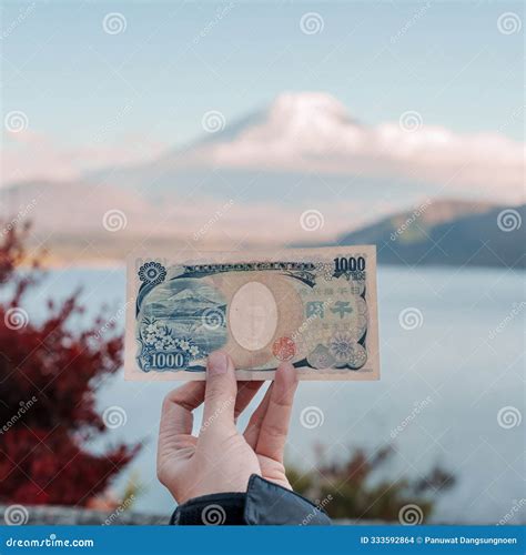 Hand Holding Yen Banknote With Mount Fuji At Lake Motosu Happy