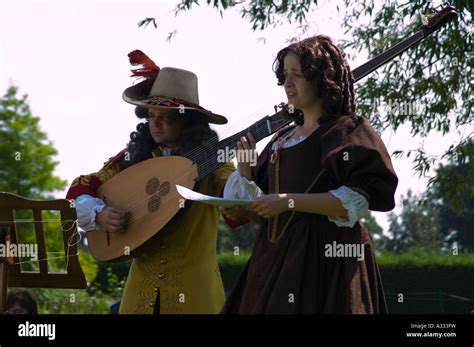 Musicians At A Restoration Period Garden Party English Heritage