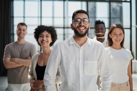 Smiling Professional Business Leaders And Employees Group Team Portrait