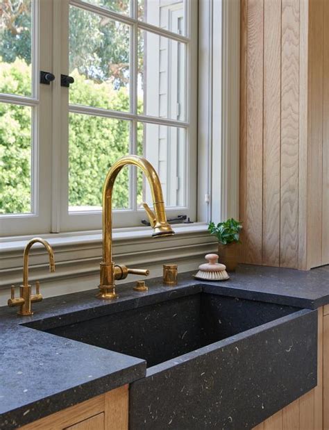 Black Apron Sink With Antique Brass Gooseneck Faucet Cottage Kitchen