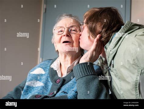 Down Syndrome Daughter Embracing 85 Yo White Mother Tienen Flanders