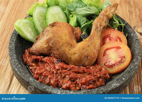 Ayam Penyet Or Penyetan Ayam Fried Chicken With Spicy Sambal Chilli