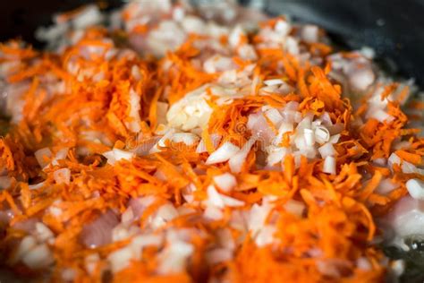 Cooking For Soup Chopped Carrots And Onions Are Fried In A Pan Stock