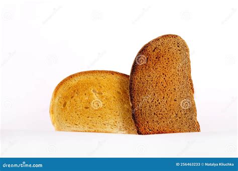 Two Slices Of Toasted Bread White And Black Piece Of Bread On A White