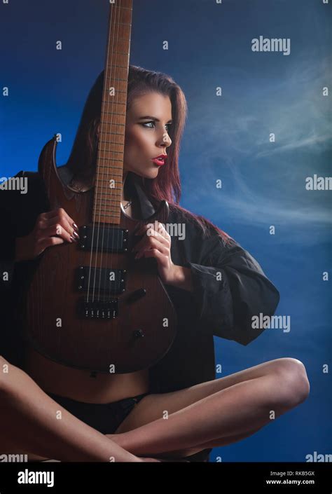 Hot Girl Holding Guitar