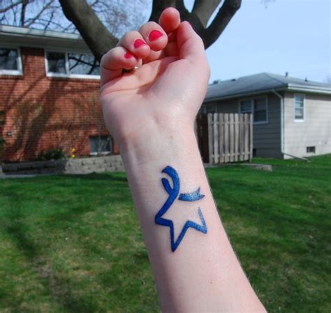 Cancer images gallery: Colon cancer awareness ribbon tattoos