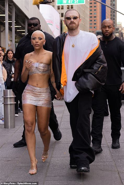 Doja Cat Rocks Bandeau And Micro Skirt Made Of PLASTIC WRAP As She