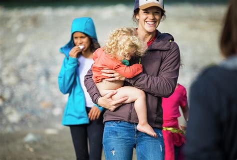 A Mother Carries Her Half Naked Baby Photograph By Christopher Kimmel Pixels