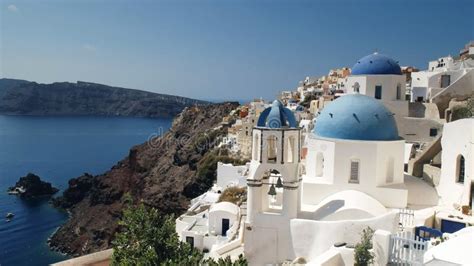 Wide Shot Of The Famous Three Domes In Oia Santorini Stock Footage