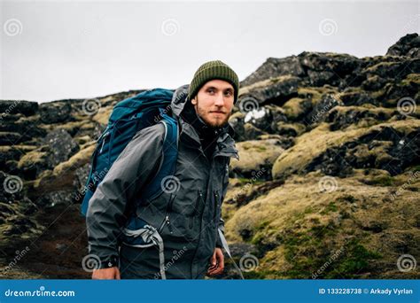 Young Man Hikes Through Rough Iceland Terrain Stock Photo Image Of