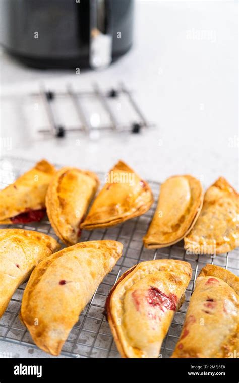 Sweet Cherry Empanadas In Air Fryer Stock Photo Alamy