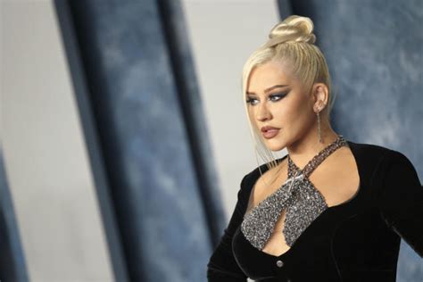 Christina Aguilera Makes A Glamorous Arrival In Custom Chrome Hearts