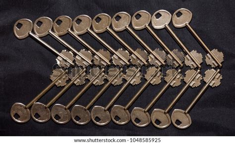 Set Identical Keys On Black Background Stock Photo 1048585925