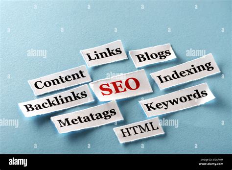 SEO Word Cloud Printed On Paper On Blue Stock Photo Alamy