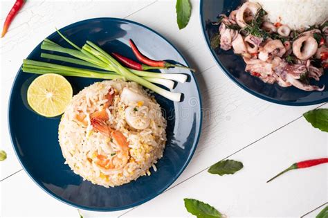 Fried Rice With Shrimp And Squid On The Blue Dish Stock Image Image