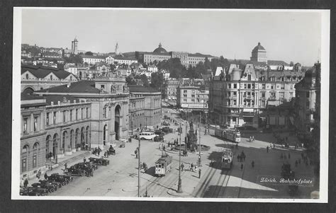 Zürich Bahnhofplatz mit diversen Trams und alten Autos Kaufen auf Ricardo