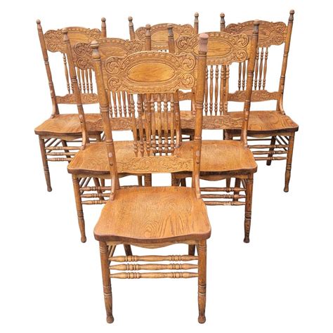 Vintage Amish Oak Country Pressed Back Spindle Chairs A Set Of 4 At