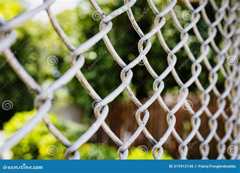 Steel Wire Mesh Fence stock photo. Image of link, freedom - 319912146