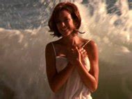 Naked Kari Wuhrer In Sand