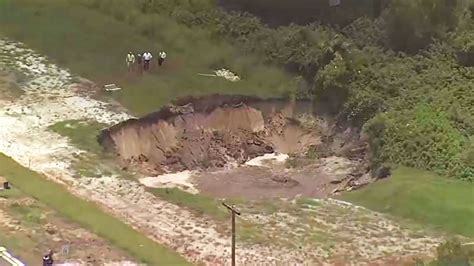 Sinkhole Opens Near Scott Lake In Lakeland