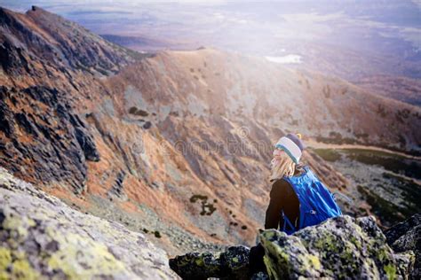 Beautiful Blonde Woman Enjoys The Moment While Hiking In The Slovak