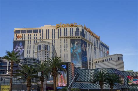 Planet Hollywood Hotel Surrounded By Lush Green Palm Trees Colorful