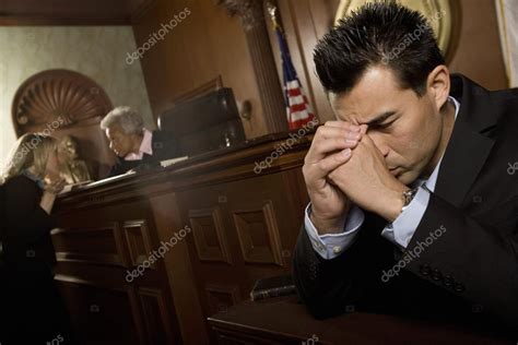 Guilty Man In Court Room Stock Photo By Londondeposit