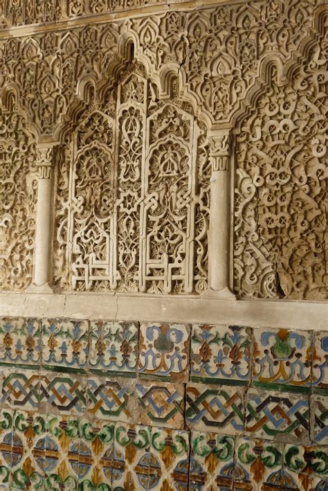 An Intricately Decorated Wall In The Middle Of A Building