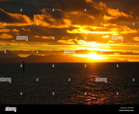 Sunset over Bora-Bora, view of Northern Bora Bora coast from Huahine ...